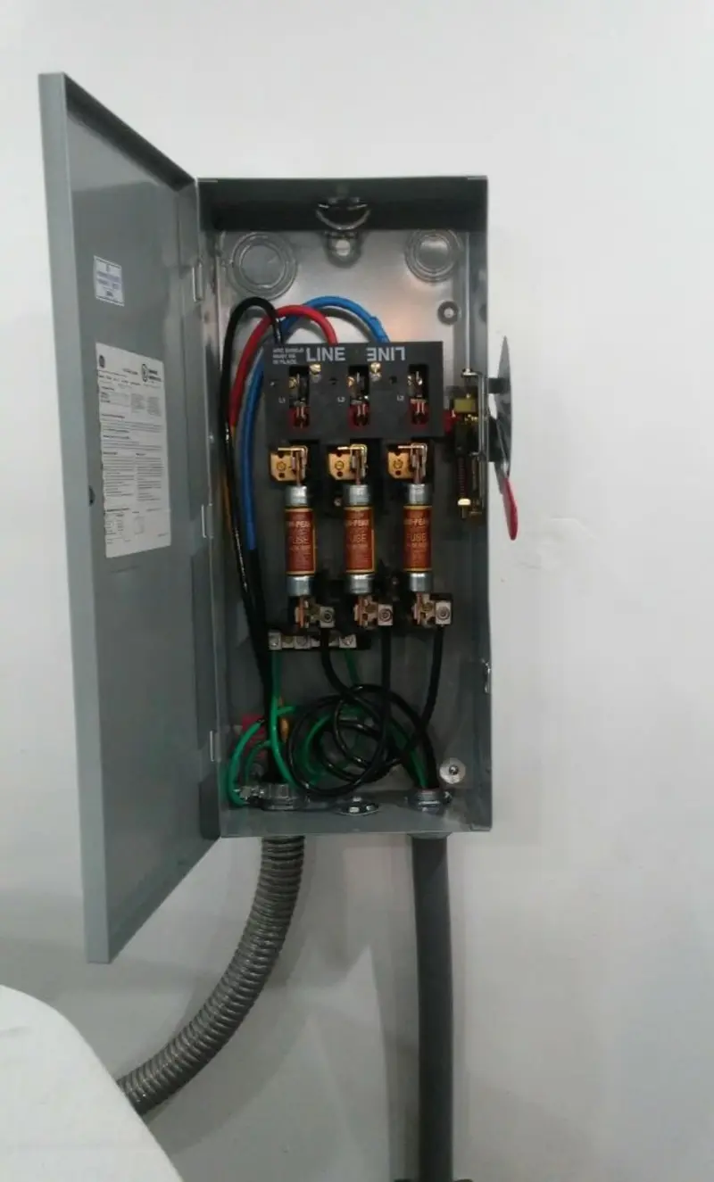 Three-phase disconnect switch installed for Smoke Detector Installation in Mission Bend